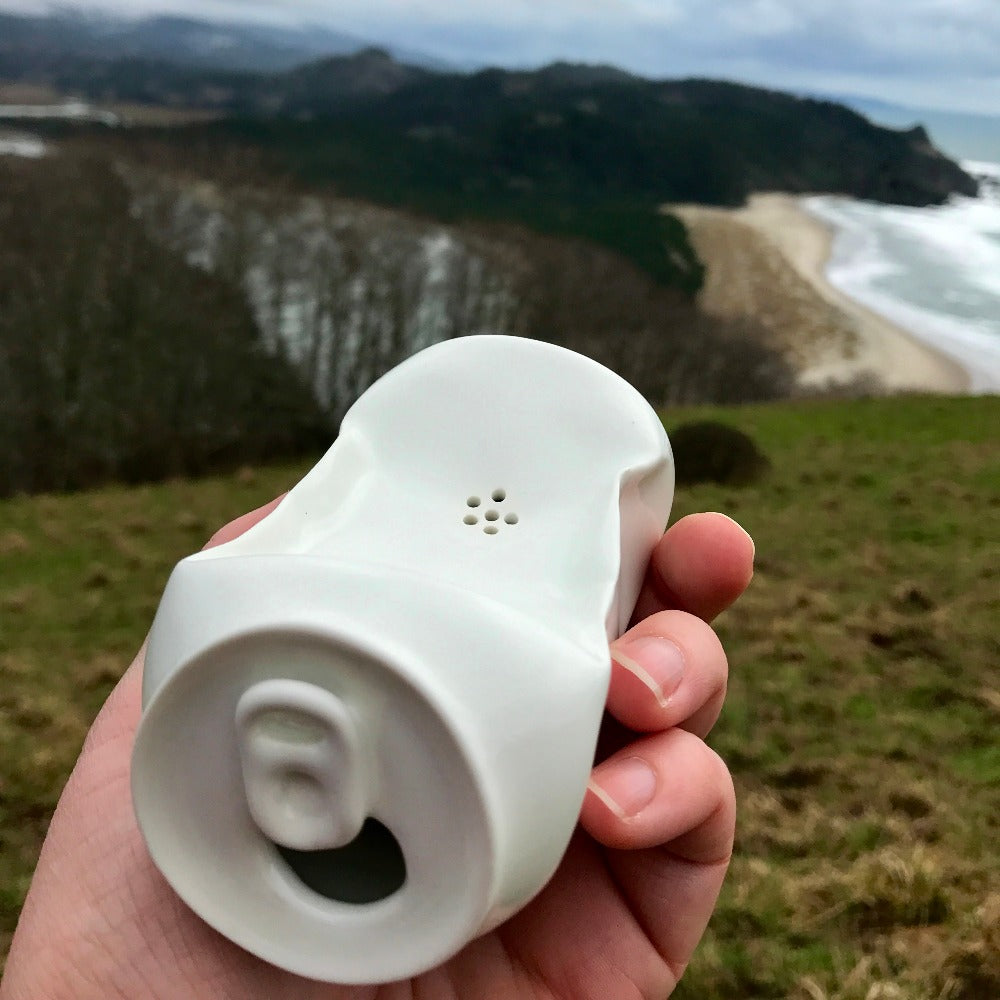 can pipe in ceramic porcelain by candy relics view over the beach